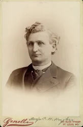 Bust Portrait of Dr. Charles Hamilton Hughes Wearing a Suit